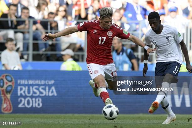 Denmark's defender Jens Stryger Larsen vies with France's forward Ousmane Dembele during the Russia 2018 World Cup Group C football match between...