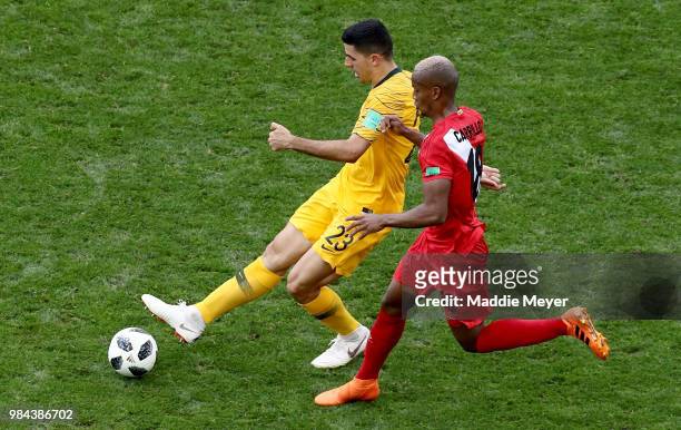 Tom Rogic of Australia is challenged by Andre Carrillo of Peru during the 2018 FIFA World Cup Russia group C match between Australia and Peru at...