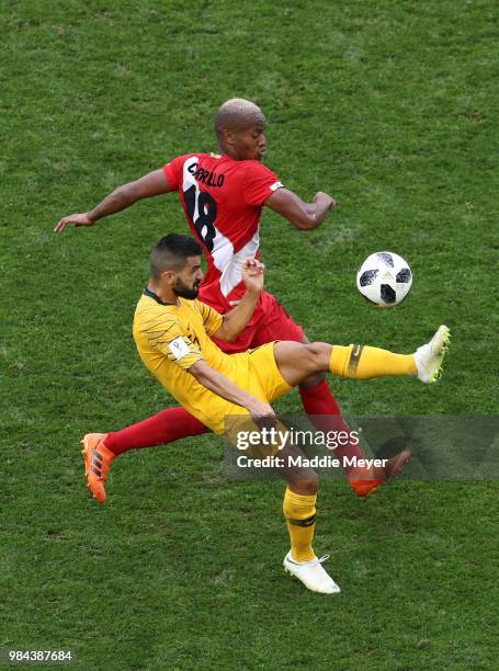 Aziz Behich of Australia controls the ball under pressure from Andre Carrillo of Peru during the 2018 FIFA World Cup Russia group C match between...