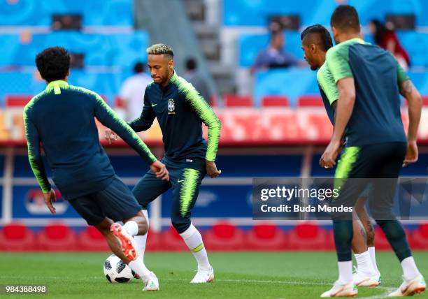 Marquinhos, Neymar, Paulinho and Renato Augusto in action during a Brazil training session and press conference ahead of the Group E match against...