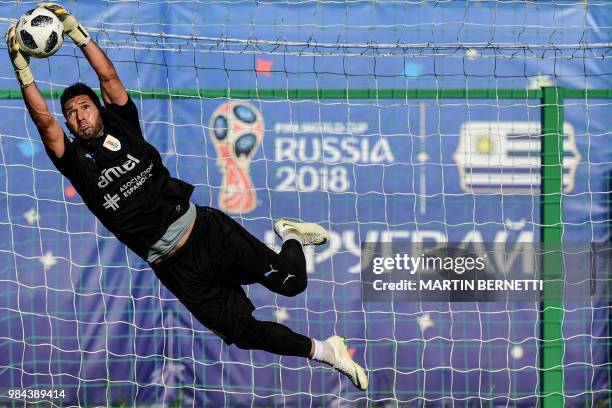 Uruguay's goalkeeper Martin Campana catches the ball as he takes part in a training session of Uruguay's national football team at the Sport Centre...