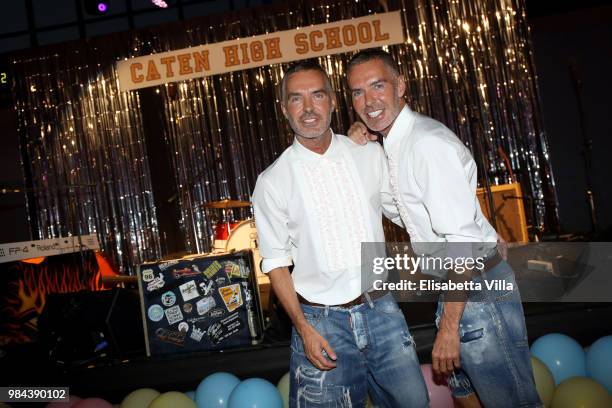 Fashion designers, founders and owners of Dsquared2 Dan Caten and Dean Caten pose fot a photo at the Caten Hight School Prom DSquared2 as a part of...