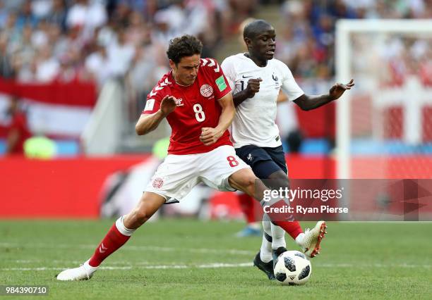 Thomas Delaney of Denmark is challenged by Ngolo Kante of France during the 2018 FIFA World Cup Russia group C match between Denmark and France at...