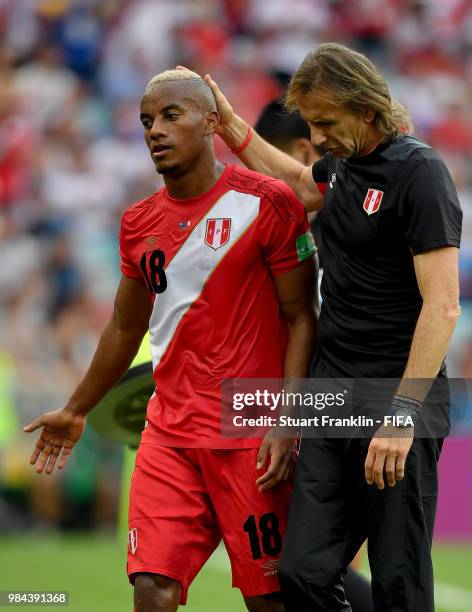 Ricardo Gareca, Head coach of Peru greets Andre Carrillo of Peru as he is substituted off during the 2018 FIFA World Cup Russia group C match between...