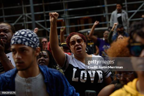 People protest a day after the funeral of Antwon Rose II in front of the Allegheny County Courthouse on June 26, 2018 in Pittsburgh, Pennsylvania....