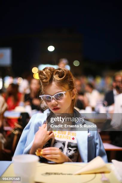 Kid model poses during the Caten Hight Shool Prom DSquared2 as a part of Pitti Bimbo Kids Fashion Week at Palamattioli on June 21, 2018 in Florence,...