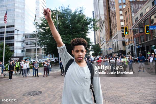 Christian Carter of East Liberty, Pennsylvania leads protesters as they block a major downtown intersection a day after the funeral of Antwon Rose II...