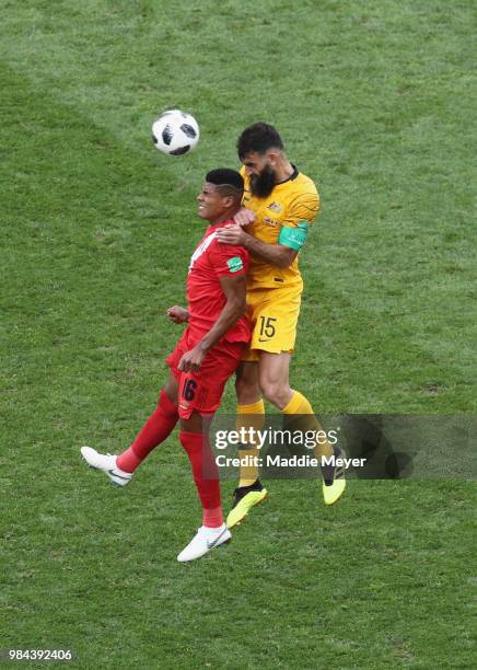 Wilder Cartagena of Peru competes for a header with Mile Jedinak of Australia during the 2018 FIFA World Cup Russia group C match between Australia...