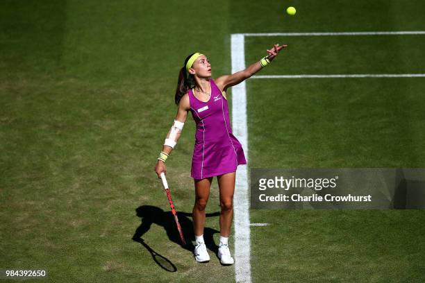 Aleksandra Krunic of Serbia serves during her women singles match against Johanna Konta of Great Britain during Day Five of the Nature Valley...