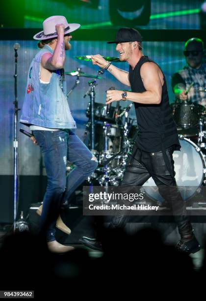 Tyler Hubbard and Brian Kelley of Florida Georgia Line performs during Lakeshake at Huntington Bank Pavilion at Northerly Island on June 24, 2018 in...