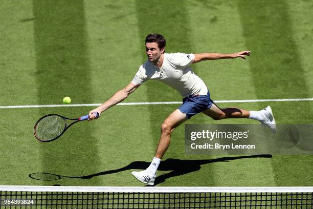 Gilles Simon of France in action against Leonardo Mayer of Argentina during day five of the Nature Valley International at Devonshire Park on June...