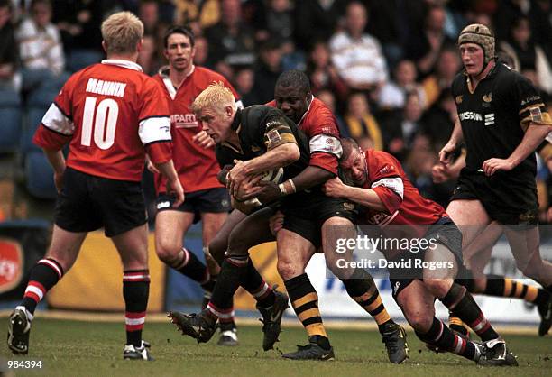 Paul Volley of Wasps breaks the tackle of Steve Ojomoh of Gloucester during the match between London Wasps and Gloucester in the Zurich Championship...