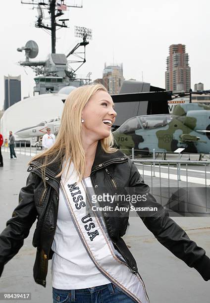Miss USA Kristen Dalton arrives to pack goody bags for overseas troops at the Intrepid Sea-Air-Space Museum on April 13, 2010 in New York City.