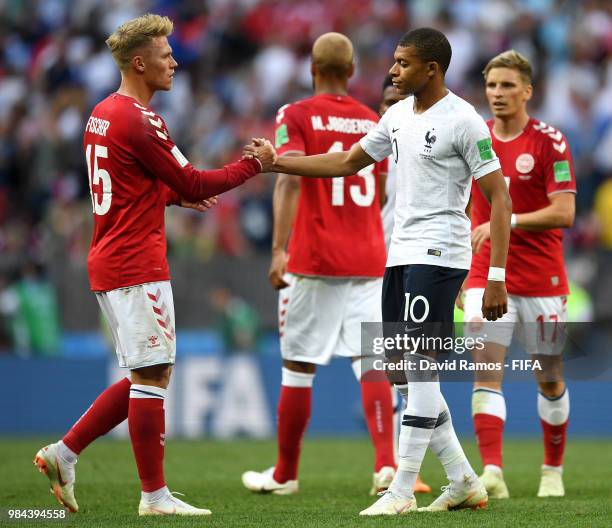Kylian Mbappe of France congratulates Viktor Fischer of Denmark following during the 2018 FIFA World Cup Russia group C match between Denmark and...