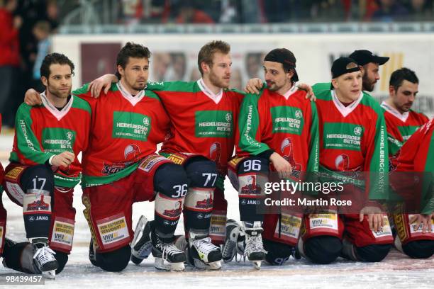 Players of Hannover celebrate after winning the third DEL play off semi final match between Hannover Scorpions and ERC Ingolstadt at TUI Arena on...