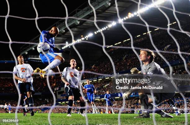 Nicolas Anelka of Chelsea scores their first goal with a header to beat Jussi Jaaskelainen of Bolton Wanderers during the Barclays Premier League...