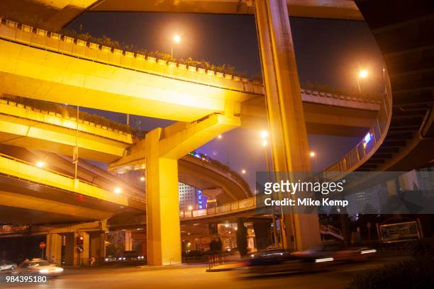 Overhead flyovers cross in this mega-junction of the Yanan Road Central Elevated Expressway, and the Chongqing North/South Elevated Expressway in...
