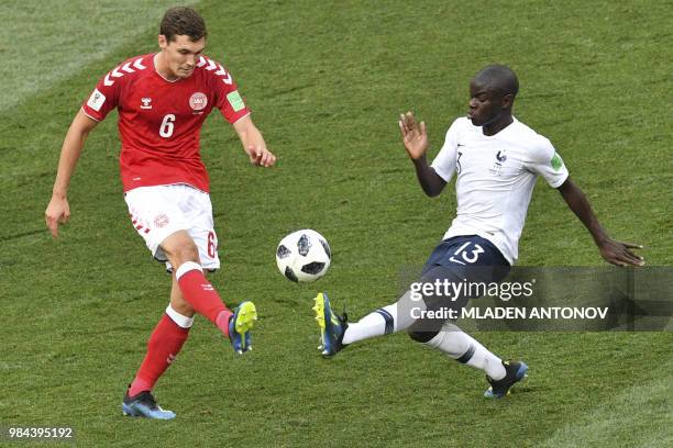 Denmark's defender Andreas Christensen vies for the ball with France's midfielder N'Golo Kante during the Russia 2018 World Cup Group C football...
