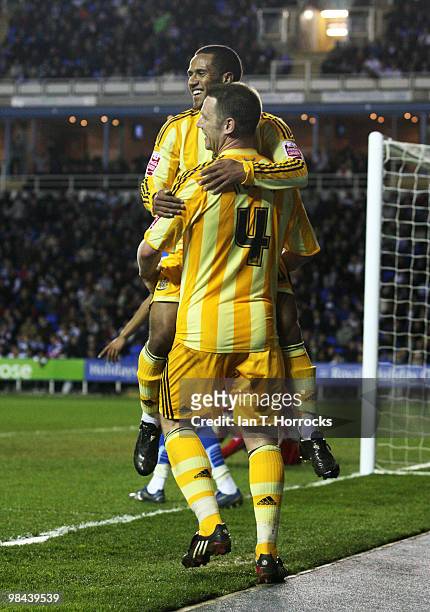 Kevin Nolan of Newcastle celebrates with Wayne Routledge after scoring the second goal during the Coca Cola Championship match between Reading and...
