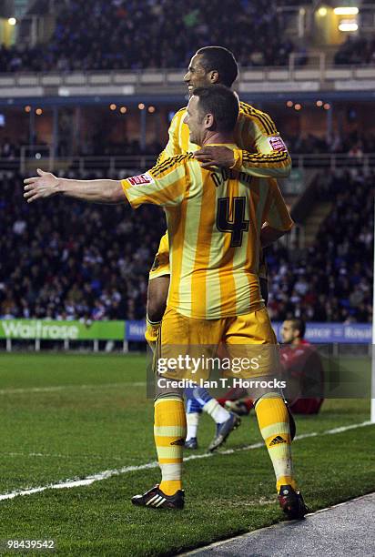 Kevin Nolan of Newcastle celebrates with Wayne Routledge after scoring the second goal during the Coca Cola Championship match between Reading and...