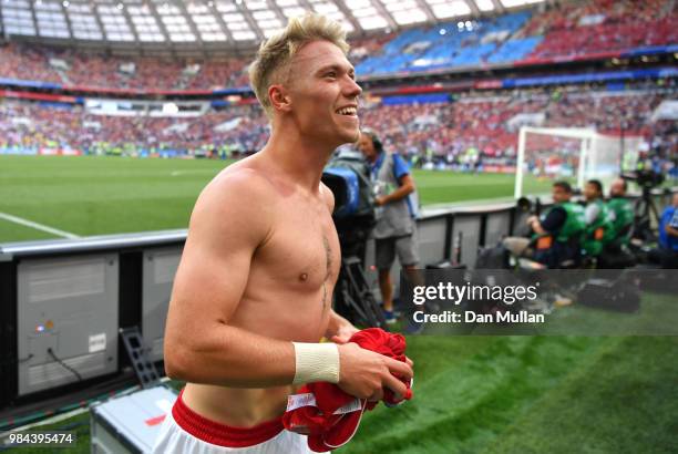 Viktor Fischer of Denmark gives his shirt to the fans following the 2018 FIFA World Cup Russia group C match between Denmark and France at Luzhniki...