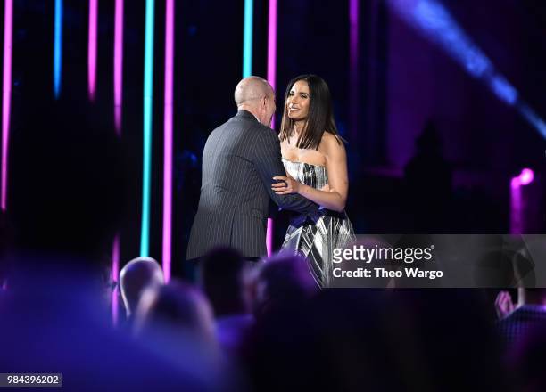 Honoree, Executive Director of the American Civil Liberties Union Anthony D. Romero accepts his award from Presenter, author Padma Lakshmi on stage...