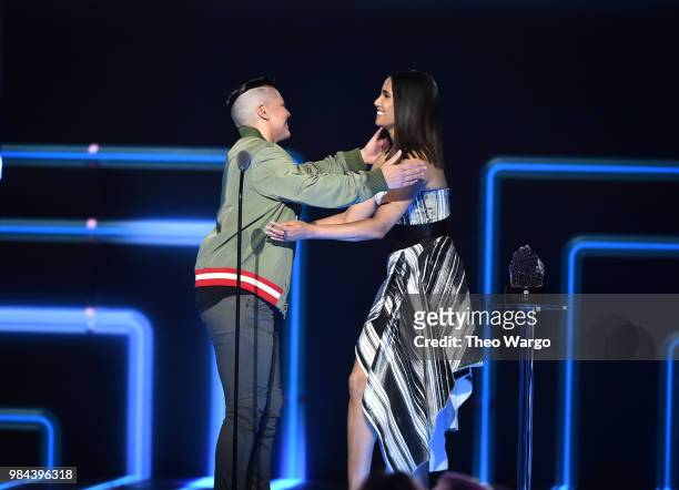 Presentor, actor Sara Ramirez and Presenter, author Padma Lakshmi greet each other on stage during VH1 Trailblazer Honors 2018 at The Cathedral of...
