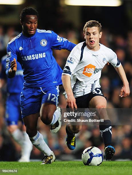 Jack Wilshere of Bolton Wanderers evades John Obi Mikel of Chelsea during the Barclays Premier League match between Chelsea and Bolton Wanderers at...