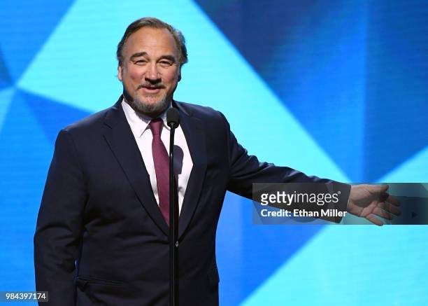 Actor Jim Belushi presents the Vezina Trophy during the 2018 NHL Awards presented by Hulu at The Joint inside the Hard Rock Hotel & Casino on June...