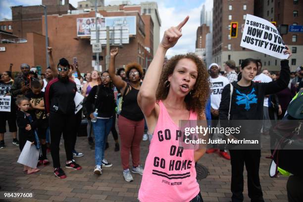 Marie Hudzinski, a cousin of Antwon Rose II, yells at an angry motorist at a protest a day after the funeral of Rose that blocked streets on June 26,...