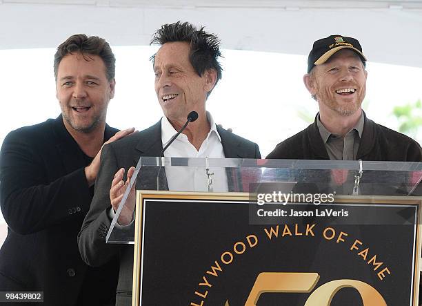 Actor Russell Crowe, producer Brian Grazer and producer Ron Howard attend Russell Crowe's induction into the Hollywood Walk Of Fame on April 12, 2010...