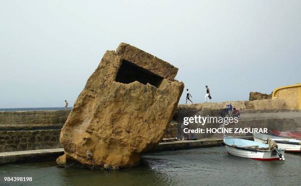 The ruin of a Punic tomb is pictured 14 August 2002 at the today's port of Tipasa. On he Shores of the Mediterranean, Tipasa was an ancient Punic...
