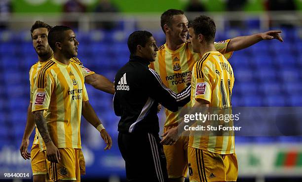 Newcastle United player Kevin Nolan celebrates with manager Chris Hughton at the end of the Coca-Cola Championship game between Reading and Newcastle...