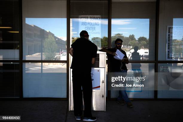 Dropping off ballots at the Jefferson County DMV June 26, 2018 in Arvada, Colorado.