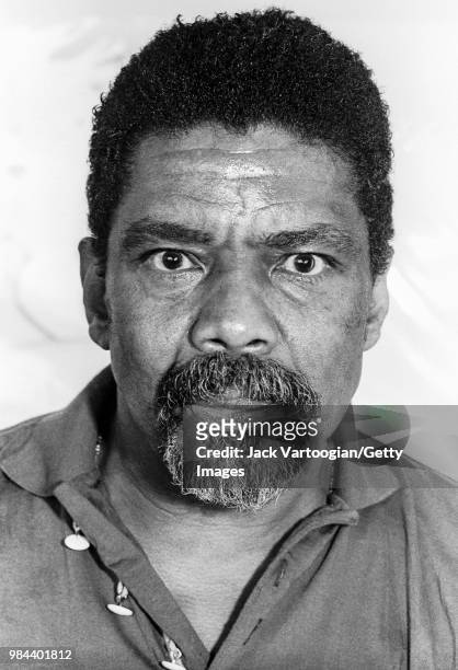 American dancer and choreographer Alvin Ailey poses for a portrait in his office at the Alvin Ailey American Dance Theater Center in New York, New...