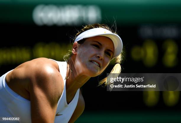 Eugenie Bouchard of Canada serves against Lin Zhu of China during Wimbledon Championships Qualifying - Day 2 at The Bank of England Sports Centre on...