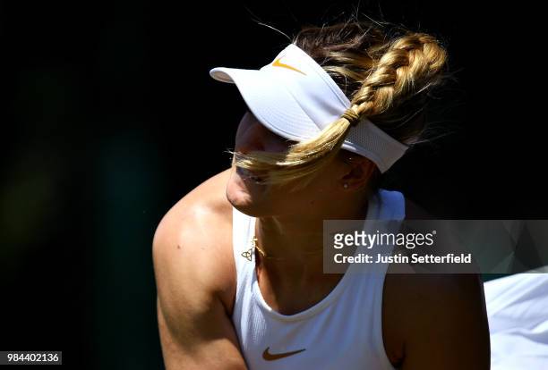 Eugenie Bouchard of Canada serves against Lin Zhu of China during Wimbledon Championships Qualifying - Day 2 at The Bank of England Sports Centre on...