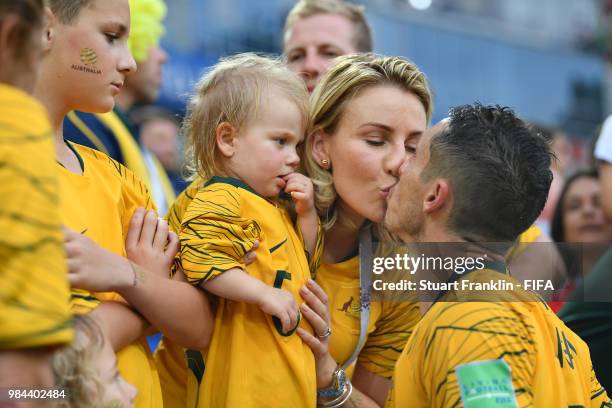 Mark Milligan of Australia speaks with his family after the 2018 FIFA World Cup Russia group C match between Australia and Peru at Fisht Stadium on...