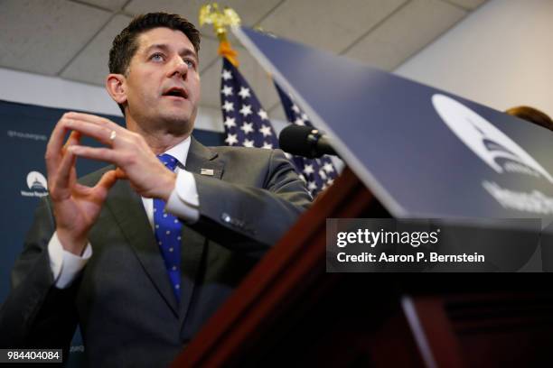 Speaker of the House Paul Ryan speaks with reporters during a news conference following a House Republican conference meeting June 26, 2018 on...