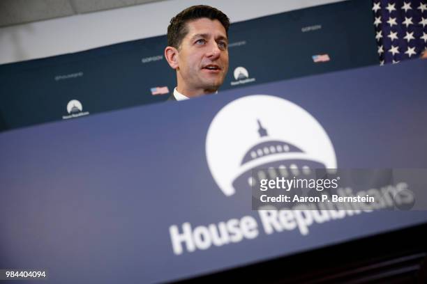 Speaker of the House Paul Ryan speaks with reporters during a news conference following a House Republican conference meeting June 26, 2018 on...