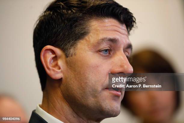 Speaker of the House Paul Ryan speaks with reporters during a news conference following a House Republican conference meeting June 26, 2018 on...