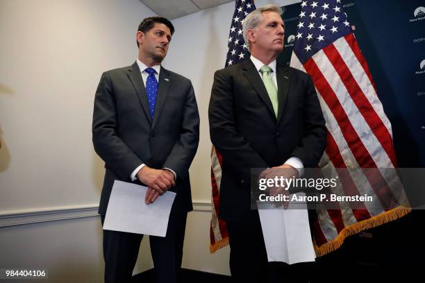 Speaker of the House Paul Ryan and House Majority Leader Kevin McCarthy look on during a news conference following a House Republican conference...