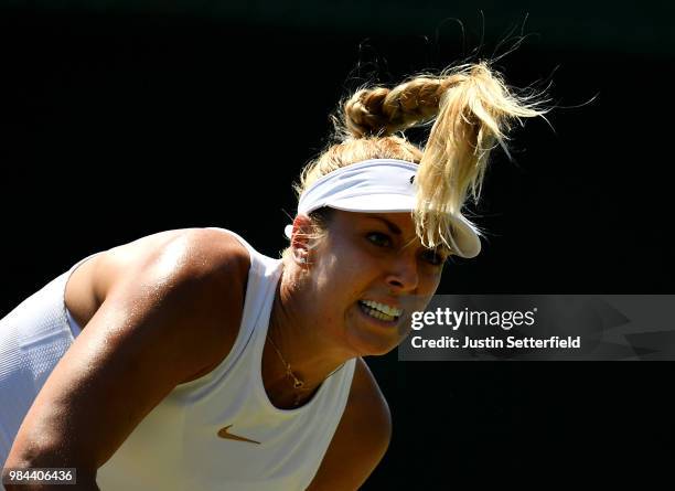 Sabine Lisicki of Germany serves against Anna Kalinskaya of Russia during Wimbledon Championships Qualifying - Day 2 at The Bank of England Sports...