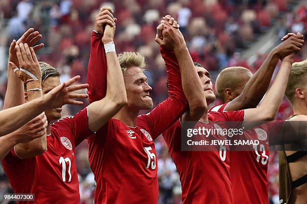 Denmark's players celebrate at the end of the Russia 2018 World Cup Group C football match between Denmark and France at the Luzhniki Stadium in...