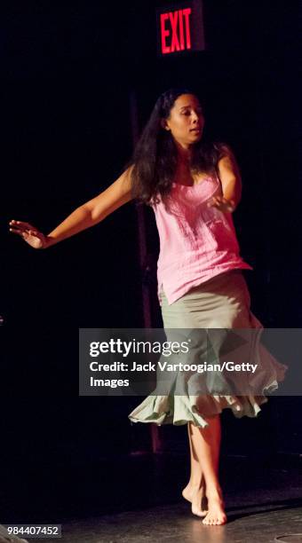 American musician and dancer Rhiannon Giddens dances to the African-American string band music of the Carolina Chocolate Drops at the World Muisc...