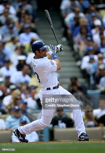 Casey Blake of the Los Angeles Dodgers hits a two run home run in the fourth inning against the Arizona Diamondbacks on April 13, 2010 at Dodger...