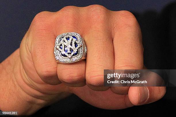 Detail of the World Series ring worn by Alex Rodriguez of the New York Yankees is seen during a press conference after the Yankees home opener at...