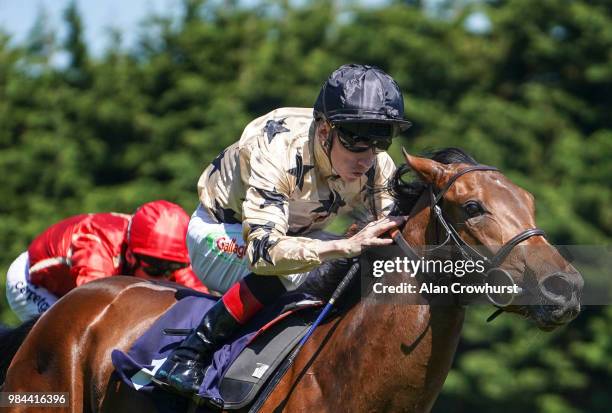 Shane Kelly riding More Than Likely wins The bet365 Novice Auction Stakes at Brighton Racecourse on June 26, 2018 in Brighton, United Kingdom.