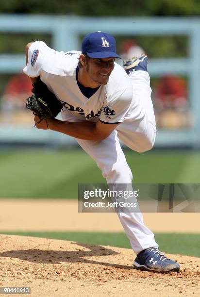 Clayton Kershaw of the Los Angeles Dodgers throws a pitch in the fourth inning against the Arizona Diamondbacks during the home opener at Dodger...