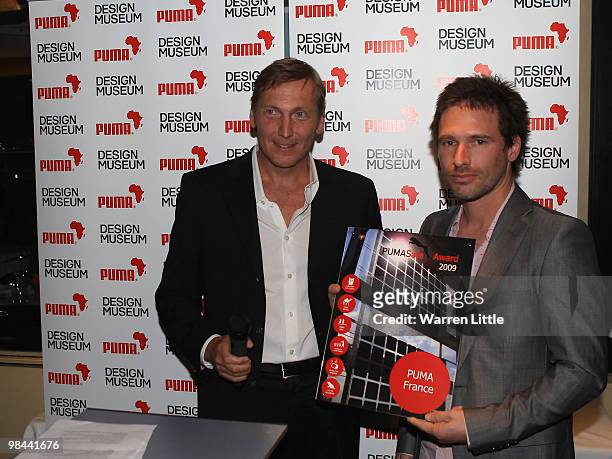 Jochen Zeitz, Chairman and CEO PUMA hands over the best employee idea award at The PUMA VIP dinner for the launch of their new packaging and...